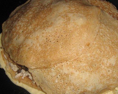 bedek de vulling met pannenkoeken